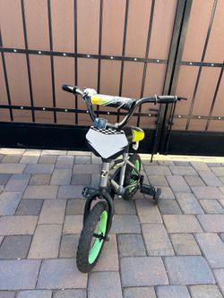 Huffy bike with training wheels