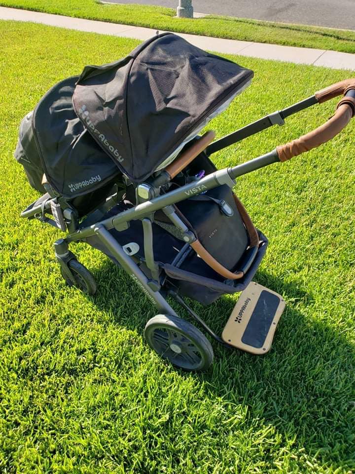 Double Stroller With Piggyback Ride Along Board