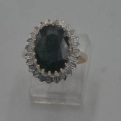 10kt yellow gold ring with very dark blue stone 5 grams with 8 diamonds 834199-3