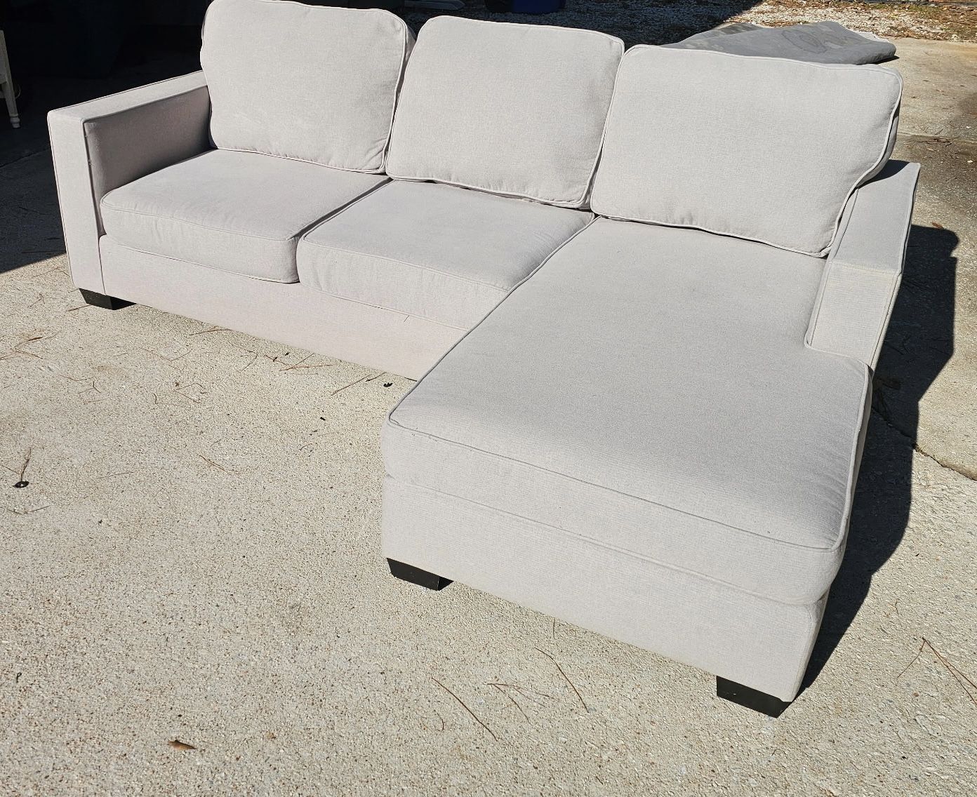 Living Spaces Egan II Reversible Chaise Sofa in Cement Gray