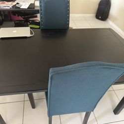 Table With Extra Pieces To Extend Length 