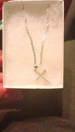 .925 - 22" chain whit a moissanite cross a silver pendant