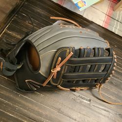 Easton Professional softball glove model 14” glove.  Brand new, rht designed with a wide heel and deep pocket, adjustable wrist for perfect fit. Color
