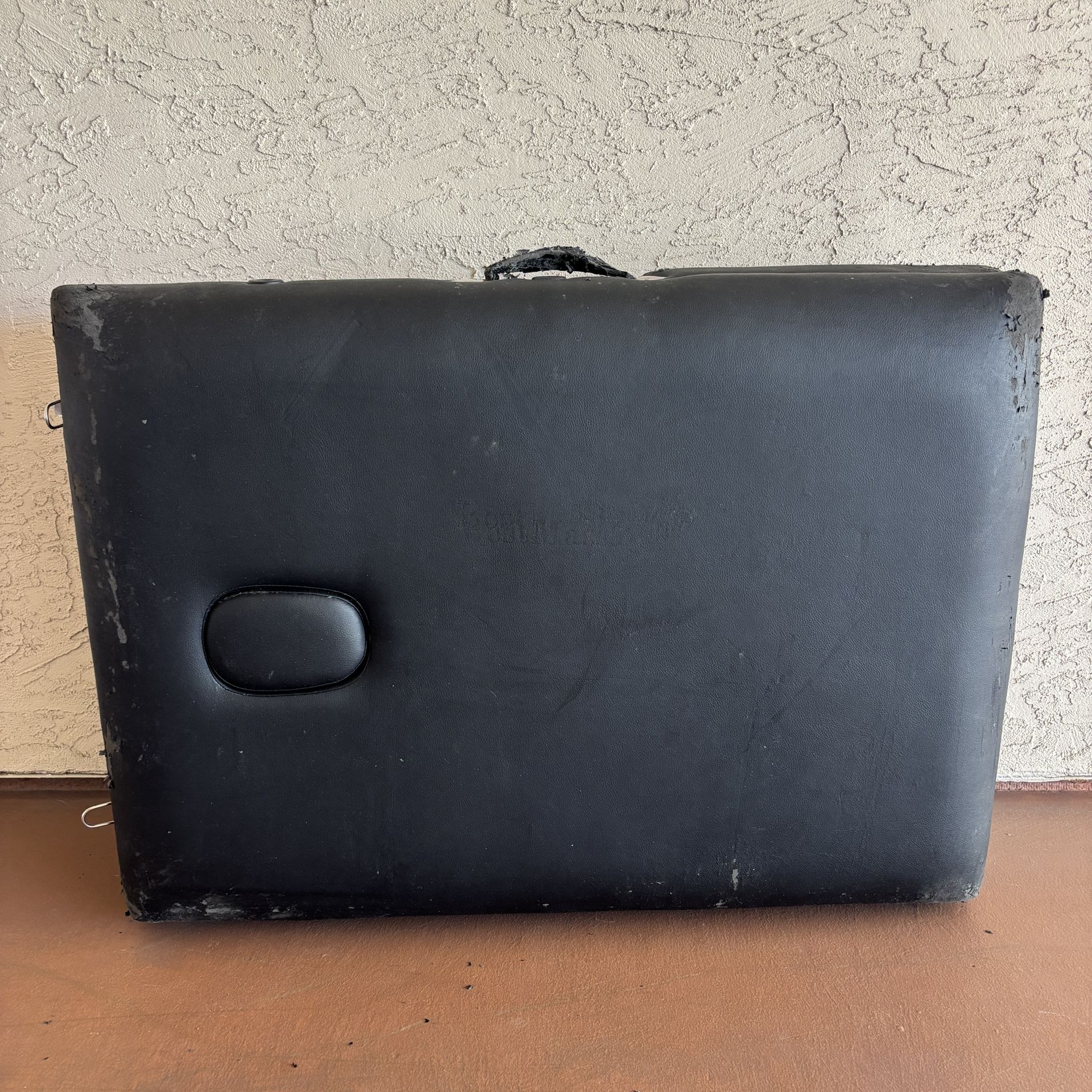 One Black Massage Table With accessories and Black Carrying Case