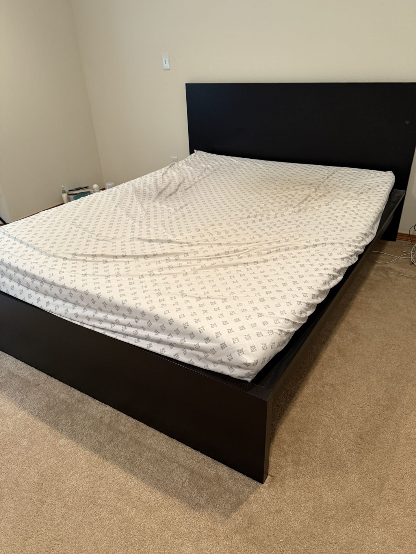 IKEA queen mattress with bed frame and tempurpedic topper.