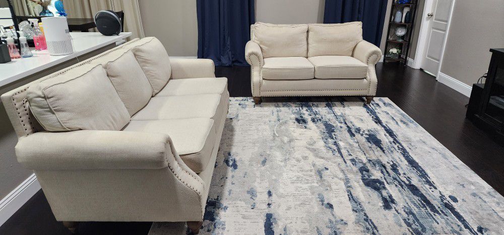 Baers Couch and Loveseat With Rug 