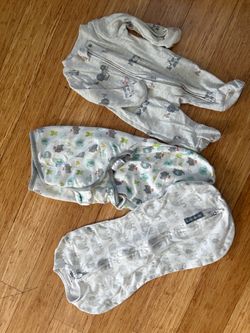 Swaddles and onesie