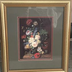 Framed floral still life print in a gold-toned wooden frame. 16.5x 14.5” Including Frame