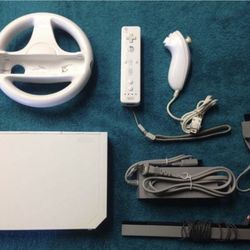 NINTENDO WII with 30 POPULAR WII GAMES INCLUDED