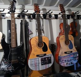 Your choice $145 each custom electric Strat style or acoustic guitar $145 each