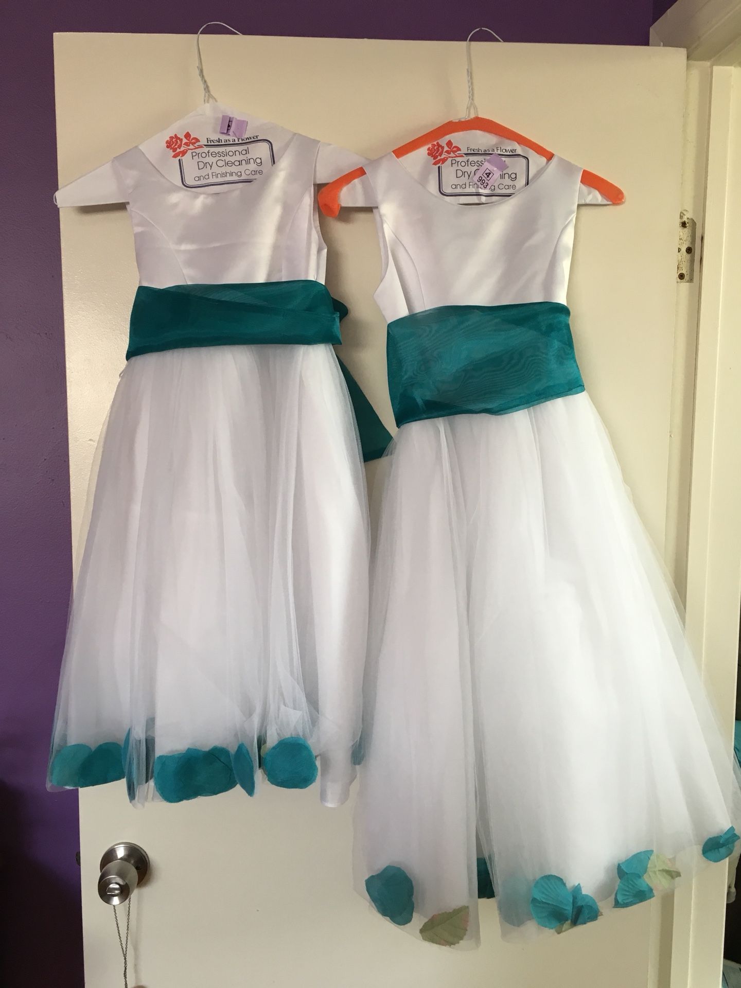 Matching flower girl dresses. Worn once. Size 6 and size 10.