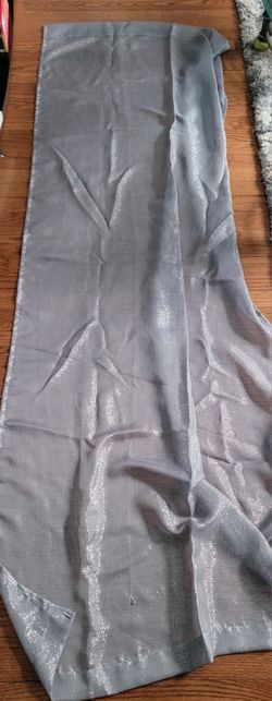 Two Silver Curtains Around 6feet By 2feet 