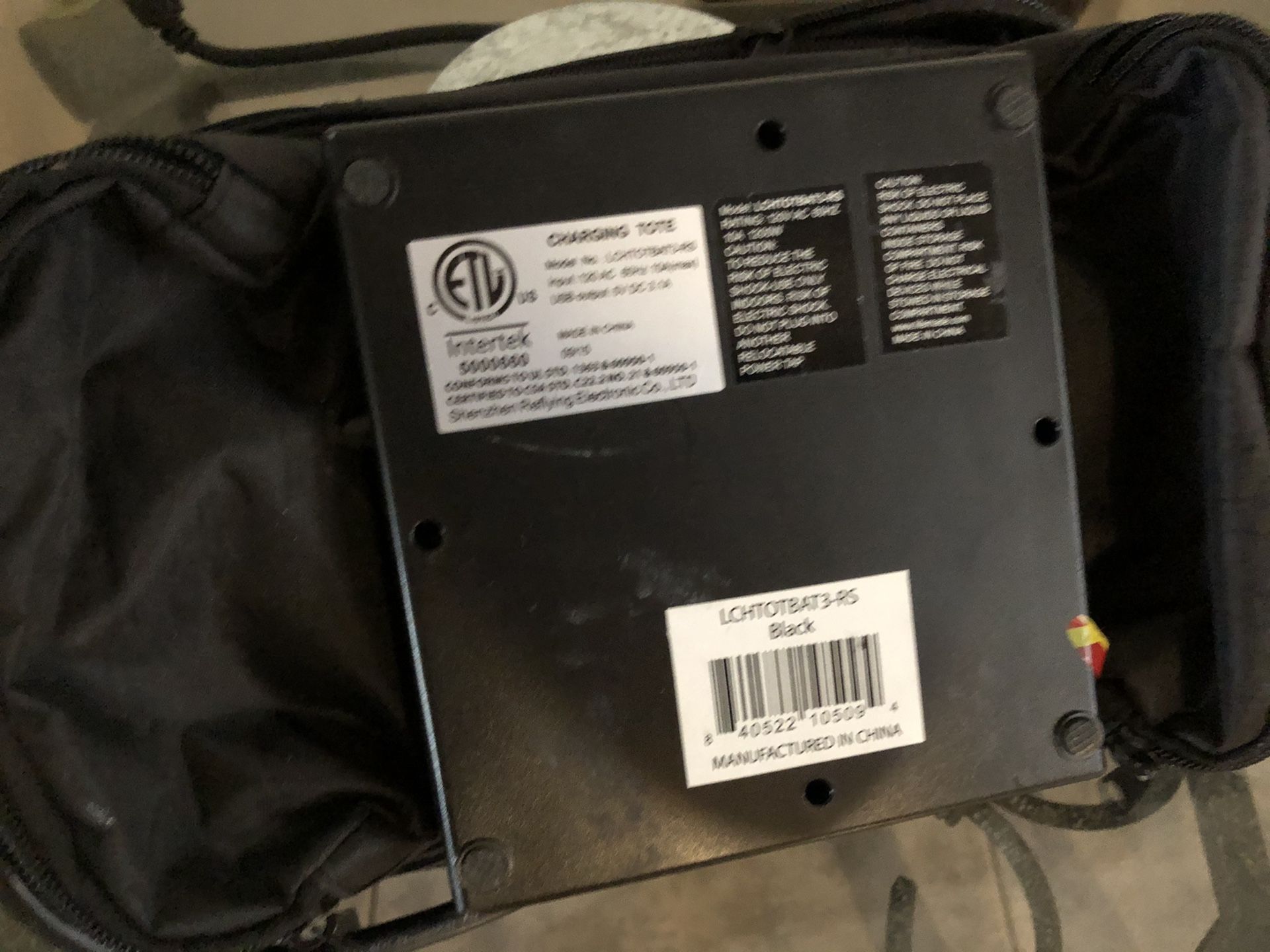 Charging port in a bag/extension cord