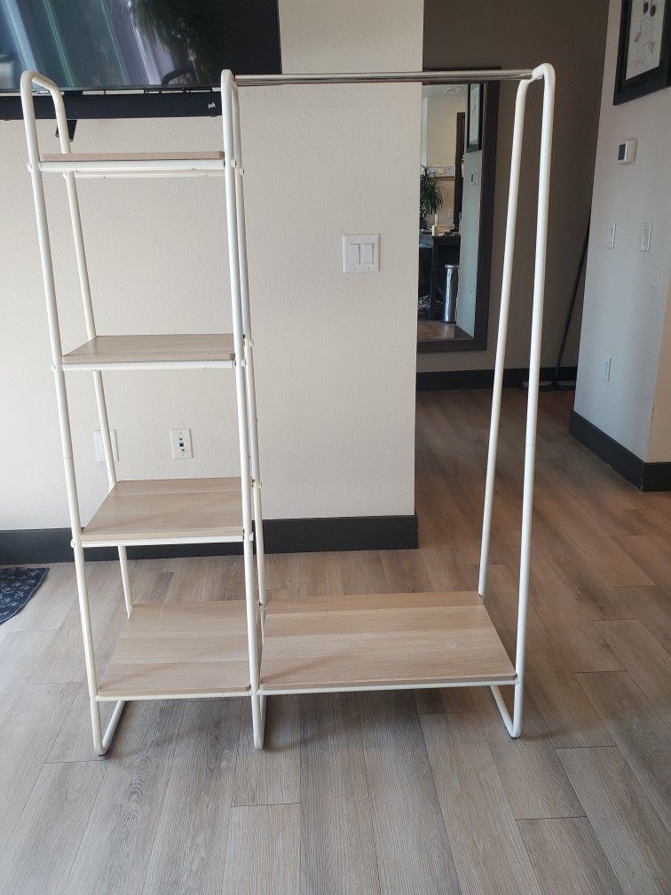 Tier Shelf With Clothing Rod