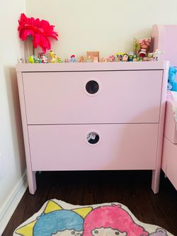 Pink Adjustable bed and matching dresser