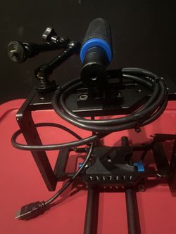 Universal Camera Cage With Camera Plugs