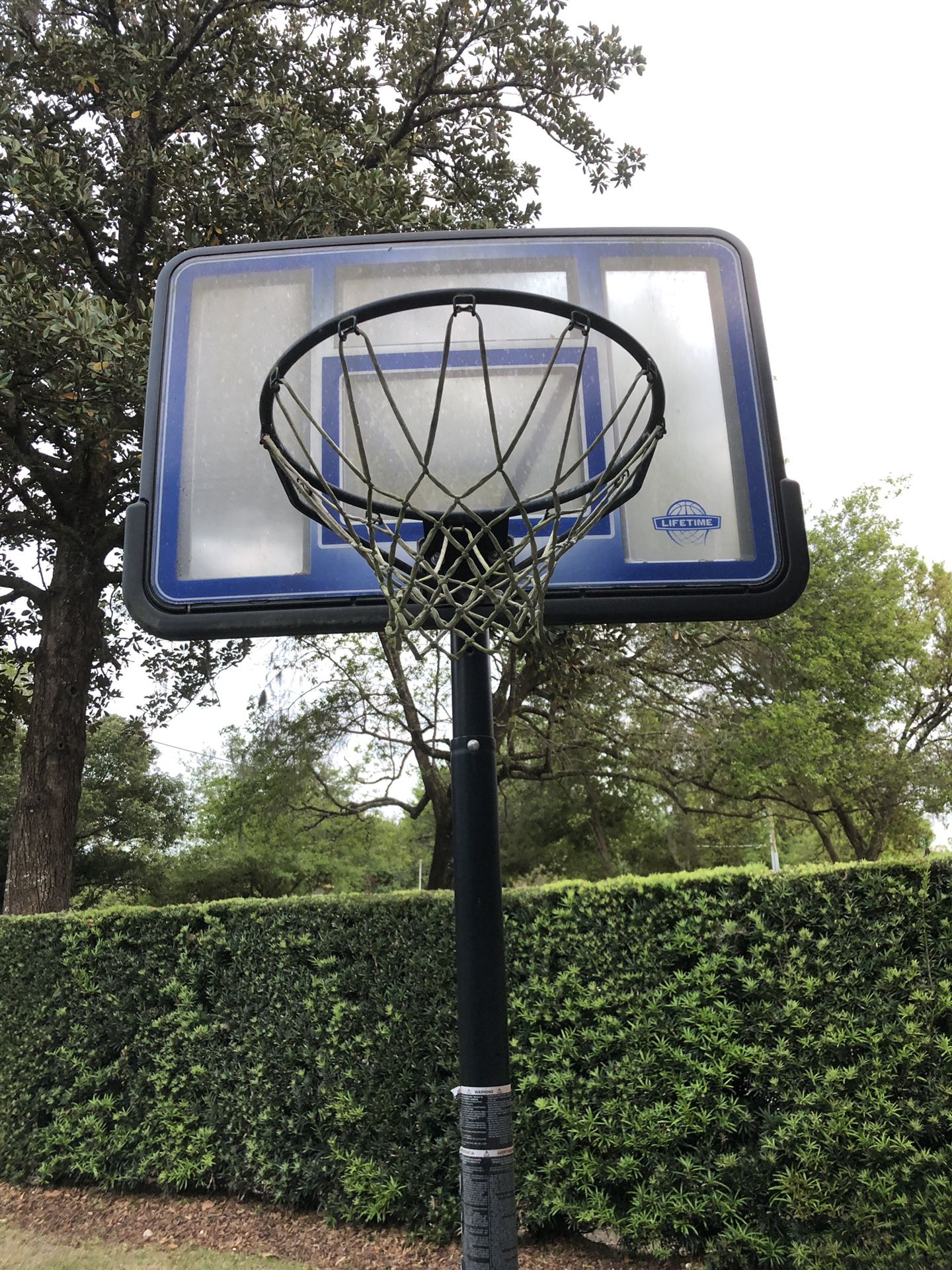 Full size basketball hoop, in good shape