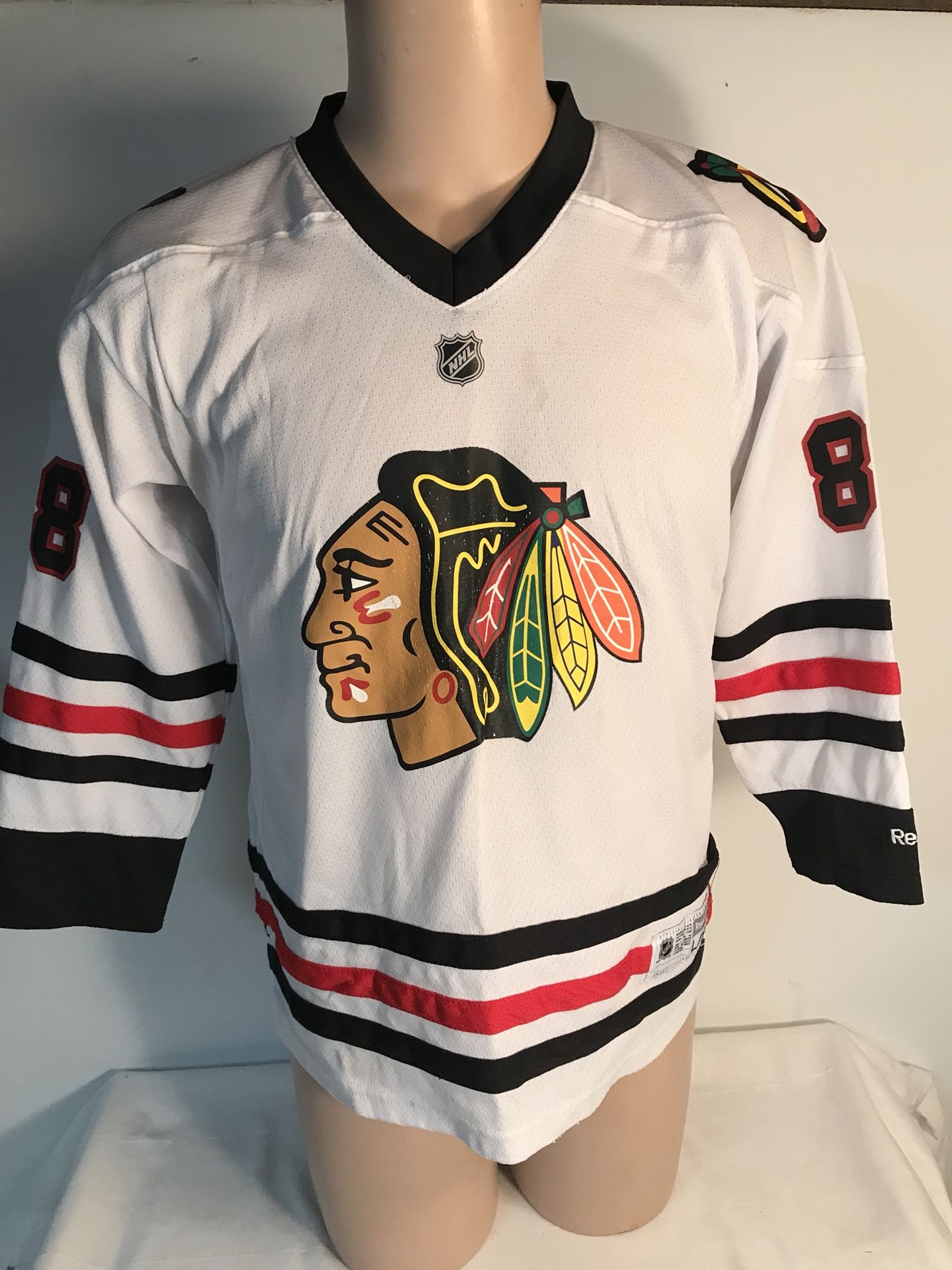 Patrick Kane youth L/XL Reebok hockey jersey Chicago blackhawks