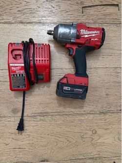 Milwaukee m18 cordless 1/2 inch impact wrench with battery and charger