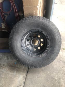 6 lug rim with used tire