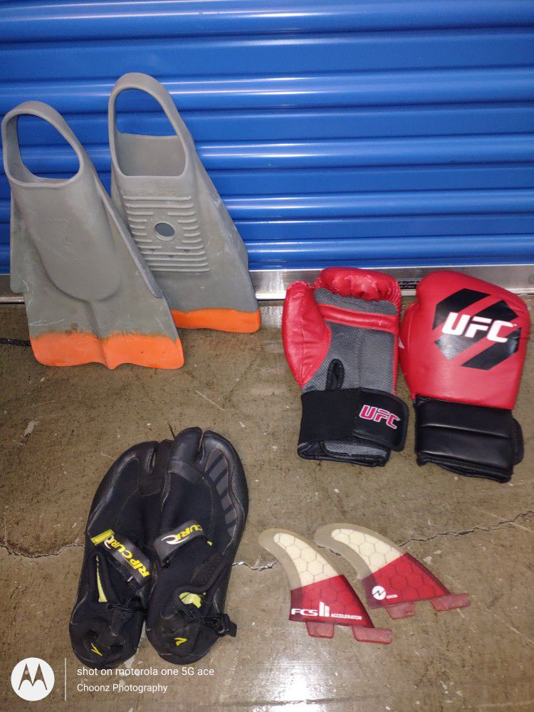 Selling Pair Of Fins, Pair Of Boxing Gloves, Pair Of Booties, And Pair Of Surfboard Fins