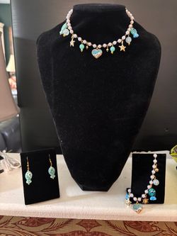 Beach themed pearl choker adjustable length with matching bracelet and Fish earrings