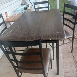 Strong Rectangular Table..with 4 Chairs..Good Condition....