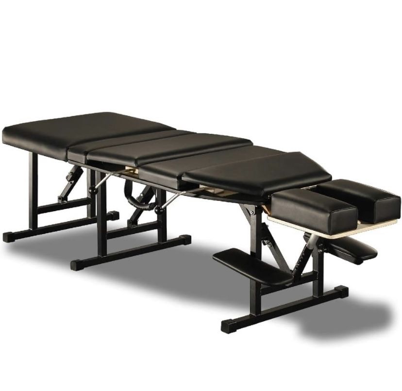 Portable Chiropractic Table With Thoracic And Pelvic Drops And Carrying Case