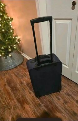 Small suitcase on wheels