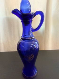 Vintage 1970s Avon Cobalt Blue Glass Decanter Cruet Pitcher with Stopper & Gold Flower Accent 9”