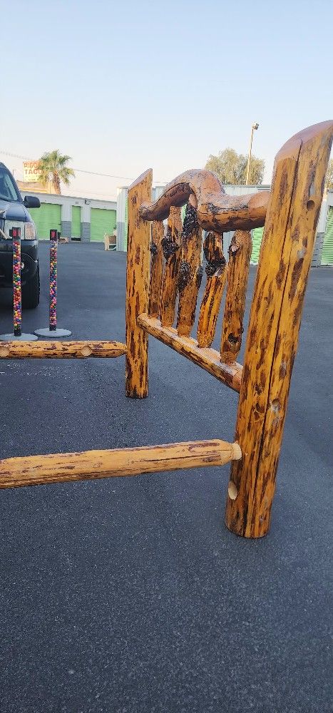 The Rustic Log Bed by Twist of Nature is a classic and stylish addition to any bedroom. Made in the United States with pine logs, this queen-sized bed