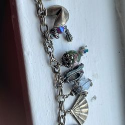 Charm Bracelet And Handmade Jar