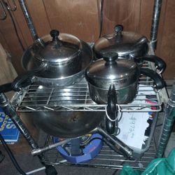 Stainless Steel Pans And Lids And A 7 Farberware Pot Boiling Pasta Or Lobsters