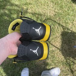 Jordan 4 Yellow Thunders 