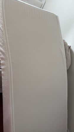 Baby high chair and crib for sale in good condition; also includes a good crib mattress. All for one price.
