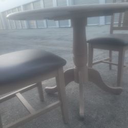 kitchen table and two chairs