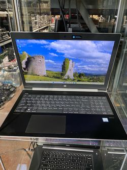 Black and silver HP ProBook 450 G5 laptop with a full keyboard, numeric keypad, and Intel Core i5 processor 8th gen. 8GB RAM . 120 GB SSD. Windows 11