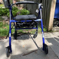 Walker with hand breaks & seat