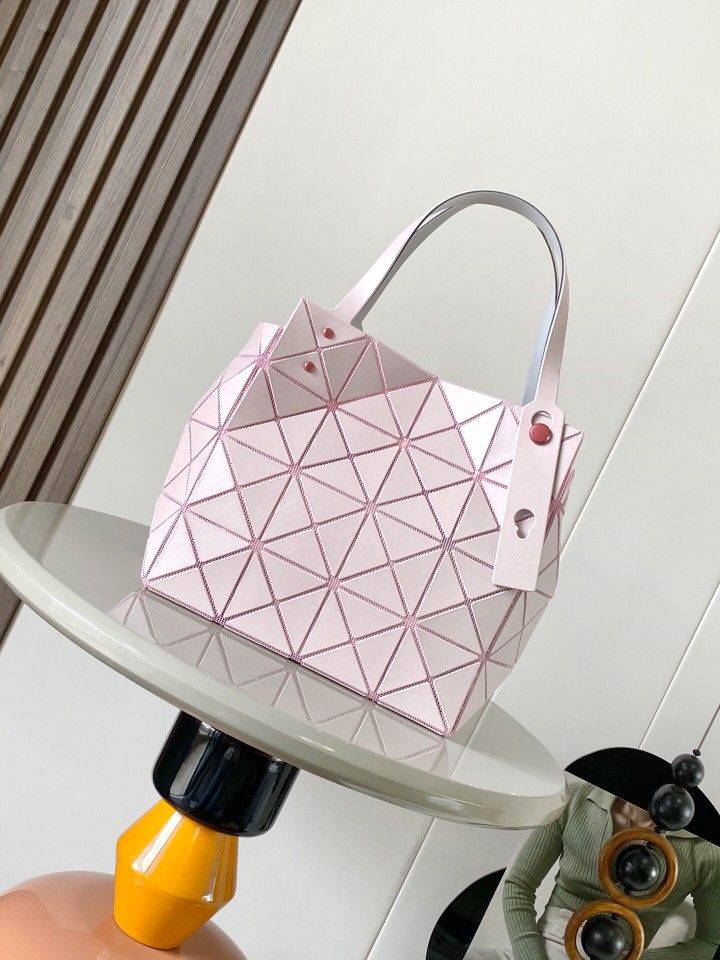 A pink Issey Miyake bag