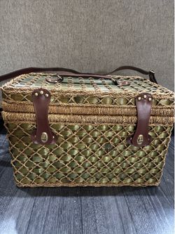 Vintage wicker and tropical palm green picnic basket service for four