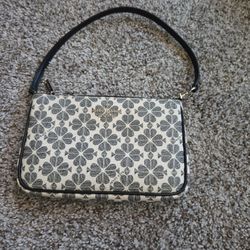 Kate Spade New York small shoulder/wristlet-style bag 