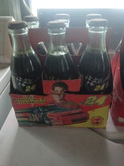 12 bottles of Coca-Cola from the 1990s