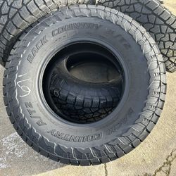 NEW Back Country AT2 Tires LT275/70R18 99% 10 PLY LOAD RANGE 