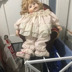 Porcelain doll and chair