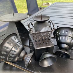 Two cast-iron outdoor outdoor candleholders… +4 other black metal outdoor candle holder/misc  Both cast-iron pieces have an awesome mid-century vibe a