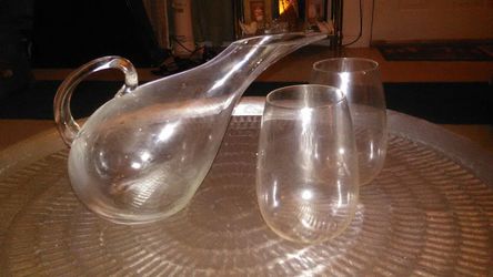 Crystal glass wine poorer with 2 Crystal glasses to match.