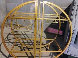 Two nice chairs with a  Gold Wine holder