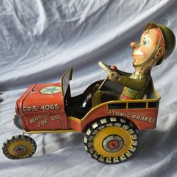 Vintage metal, wind u GI JOE toy from the 50s