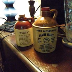 A Set Of Vintage Stoneware Jugs