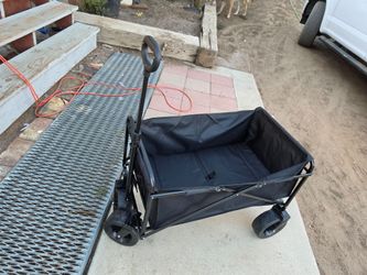 multipurpose folding wagon with wide all-terrain wheels 

     vagón plegable multiusos con ruedas todoterreno anchas